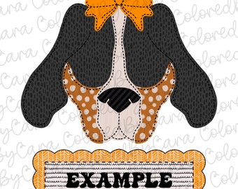 May include: A black and brown dog with a white nose and black eyes. The dog is wearing an orange bow. The dog's head is stitched together with a white thread. The dog's head is on a white background. Below the dog's head is a banner with the word "EXAMPLE" in black text on a white background. The banner is surrounded by an orange border.
