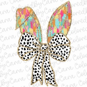 May include: A black and white polka dot bow with gold glitter accents. The bow is topped with two colourful bunny ears with gold glitter accents.