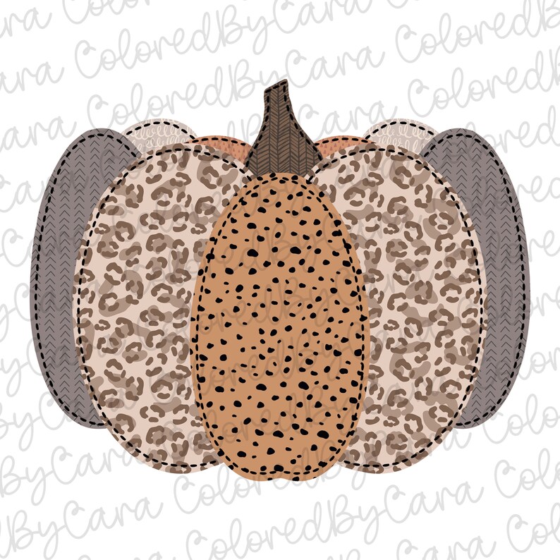 May include: A brown, beige, and gray pumpkin with a leopard print design. The pumpkin is made of fabric and has a stitched seam around the edges.