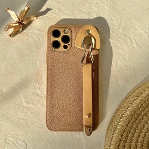 Custodia per telefono in pelle beige, impugnatura con cinturino da polso, custodia per iPhone 15, 14, 13, 12, 11, Pro Max, cover in pelle per iPhone, custodia estetica per iPhone