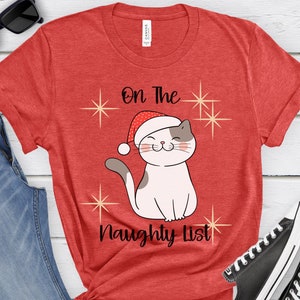 On The Naughty List, Christmas T-Shirt, Cat T-Shirt, Christmas Gift, Holiday Shirt, Cute Christmas Shirts, Naughty List Shirt, Holiday Tee