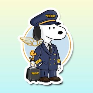 May include: A sticker featuring Snoopy from Peanuts dressed as a pilot in a navy blue uniform and cap with gold accents. He is holding a small suitcase. Woodstock is standing next to him. The background is a light blue and yellow gradient.