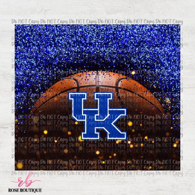 May include: A blue and white basketball with the letters "UK" in a blue circle on the side. The basketball is on a blue and gold glitter background.