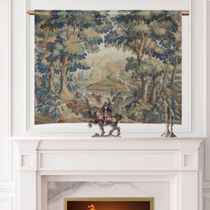 May include: A tapestry depicting a forest scene with trees, a river, and birds. The tapestry is framed and mounted above a white fireplace. A bronze statue of a person on a horse is on the mantel.