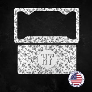 Black floral license plate frame and vanity plate for black cars or white cars