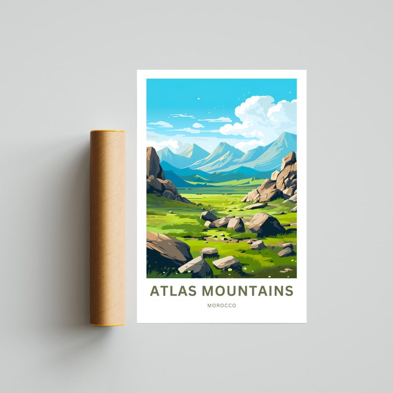 Op de afbeelding: Een poster met een gestileerd landschap van het Atlasgebergte in Marokko. Het kunstwerk toont een groene vallei met grote rotsformaties, onder een blauwe lucht met witte wolken. De tekst "ATLAS MOUNTAINS MOROCCO" staat onderaan.