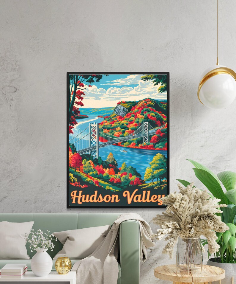 May include: A vintage-style poster featuring a colorful illustration of a bridge over a river with fall foliage in the background. The text "Hudson Valley" is printed in orange at the bottom of the poster.