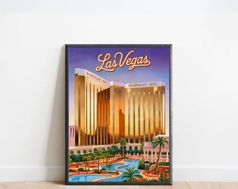 May include: A framed art print featuring a vintage-style illustration of the Mandalay Bay hotel in Las Vegas. The print showcases the hotel's golden facade, palm trees, and a pool, with "Las Vegas" in a retro font across the top.