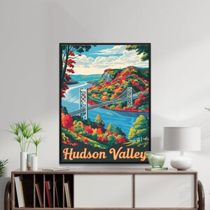 May include: A vintage-style travel poster featuring a scenic view of the Hudson Valley with a bridge crossing the river. The poster has a blue, green, and orange color scheme and the text "Hudson Valley" in a retro font.