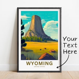 May include: A vintage-style travel poster featuring a colourful illustration of Devils Tower National Monument in Wyoming, United States. The poster has a blue sky with white clouds, a green grassy field, and a large rock formation in the centre.