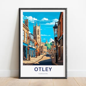 Puede incluir: Una ilustración colorida de una escena callejera en Otley, Yorkshire. La imagen presenta un alto edificio de iglesia, una calle adoquinada y edificios coloridos con puertas y ventanas azules. El texto "OTLEY" y "YORKSHIRE" está impreso en la parte inferior de la imagen.