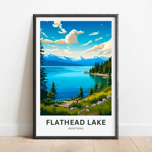 May include: A framed poster with a scenic view of Flathead Lake in Montana. The poster features a blue lake surrounded by green trees and mountains in the background. The text "Flathead Lake" and "Montana" is printed in black at the bottom of the poster.