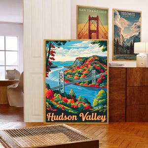 May include: A vintage-style poster with a colorful illustration of a bridge over a river with fall foliage. The text "Hudson Valley" is printed in orange at the bottom of the poster.