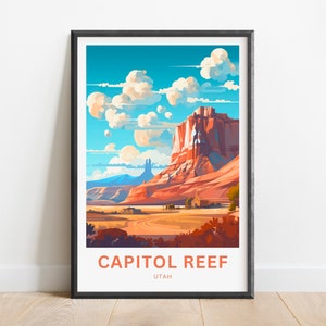 May include: A framed poster featuring a colourful illustration of a red rock formation in Capitol Reef National Park, Utah. The poster has the text "Capitol Reef" and "Utah" printed on it.