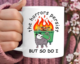 The Horrors Persist Mug, Funny Novelty Gift for Opossum Lover, Sarcastic Office Humor Gift For Coworkers and Bosses, Dumpster Fire