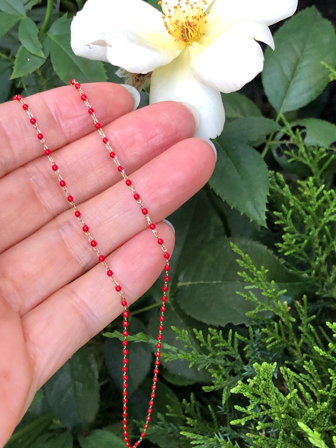 Red Beaded Necklace with Gold Pendant