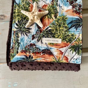 Soft and cozy beach/stroller blanket in brown minky with cotton tropical hawaiian floral print.