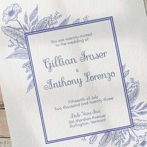 May include: A wedding invitation with blue floral illustrations and a white background. The text reads: "You are warmly invited to the wedding of Gillian Fraser & Anthony Lorenzo. Fifteenth of July Two thousand and twenty-three Dale Viero Inn 166 Marshes Avenue Burlington, Vermont"