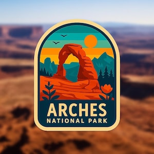 May include: A sticker featuring a stylized illustration of Arches National Park. The design includes a red rock arch, a setting sun, and the text "ARCHES NATIONAL PARK" in white. The background is a gradient of orange, teal, and blue.