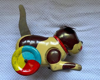 Vintage Tin Litho Puppy Toy “ Pull down Tail “