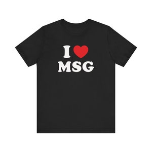 May include: Black t-shirt with a white graphic that says "I love MSG" with a red heart.