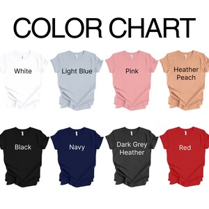May include: A color chart displaying eight t-shirts in various colors. The colors include white, light blue, pink, heather peach, black, navy, dark grey heather, and red. The text "COLOR CHART" is at the top.
