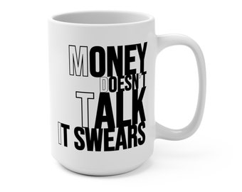 May include: White ceramic coffee mug with black text that reads "Money Doesn't Talk It Swears".