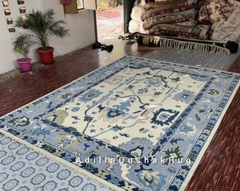 Vintage crèmekleurig en blauw Turks Oushak-tapijt: handgemaakt wollen tapijt