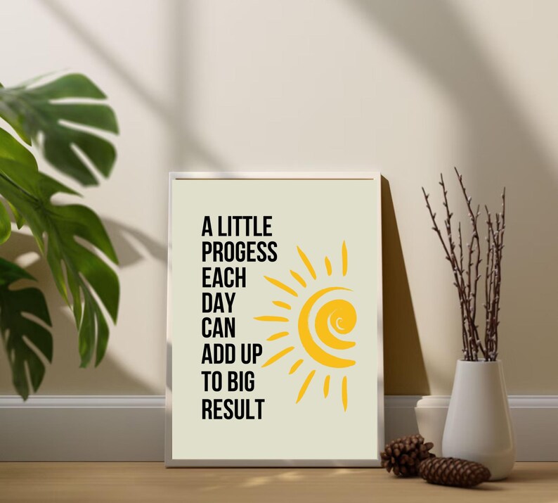 May include: A motivational quote poster with a yellow sun graphic. The quote reads "A little progress each day can add up to big result".