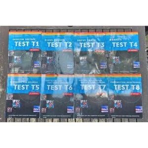 May include: A set of eight educational textbooks arranged in two rows, each featuring a blue and black cover. The titles include Gasoline Engines Test T1, Diesel Engines Test T2, Drive Train Test T3, Brakes Test T4, Suspension and Steering Test T5, Electrical and Electronic Systems Test T6, Heating, Ventilation and Air Conditioning Test T7, and Preventative Maintenance Test T8.