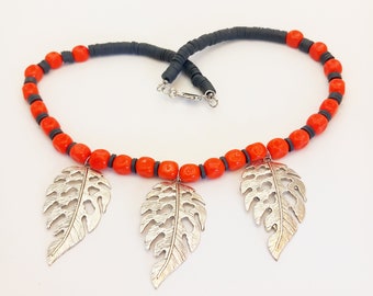 Necklace with leaves and plastic beads