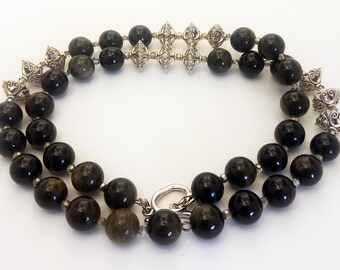 Obsidian glass beads