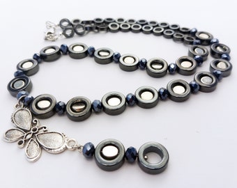 Beads from hematite circles with butterfly pendant
