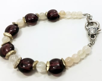Bracelet made of glass beads with metal spacers