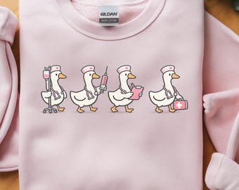 Cute Nurse Duck Sweatshirt, Funny RN Gift, Cartoon Nurse Crewneck, CNA Nursing Student Shirt, Medical Worker Top