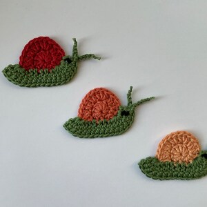 3 colorful snails, set of crocheted patches, crochet application, large selection of colors, color requests possible khaki apricot