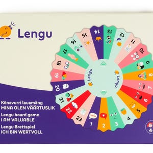 May include: A board game box with the word "Lengu" and a cartoon bird logo. The game features a colorful circular design with numbers and illustrations. Text on the box includes "Lengu board game I AM VALUABLE".