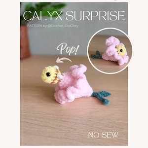 May include: A pink crocheted flower with a yellow and brown bee inside. The flower is open and the bee is visible. The text "Pop!" is written on the image. The text "NO-SEW" is written on the image. The text "PATTERN by @Crochet_Crochey" is written on the image.