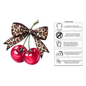 May include: Digital illustration of two glossy red cherries with a green stem and a leopard print bow. The image includes instructions for home ironing on cotton, polyester, and poly-cotton blends.