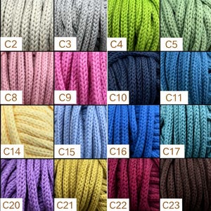 May include: A grid of twenty-four samples of braided cord in various colors, labeled C1 through C24. The colors include white, gray, green, pink, blue, yellow, red, purple, brown, and black. Each square displays a textured, woven rope.