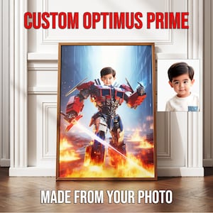 Puede incluir: Una impresión enmarcada que presenta la cara de un niño superpuesta a una ilustración de Optimus Prime, sobre un fondo de fuego. Los textos "CUSTOM OPTIMUS PRIME" y "MADE FROM YOUR PHOTO" se muestran en rojo y blanco.