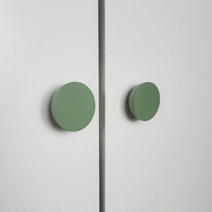 Green door knobs