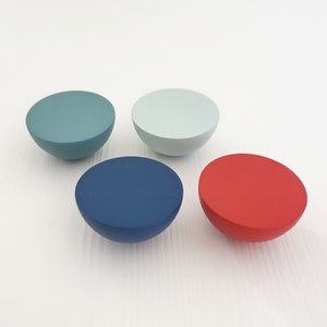 Round colorful knobs for cabinets