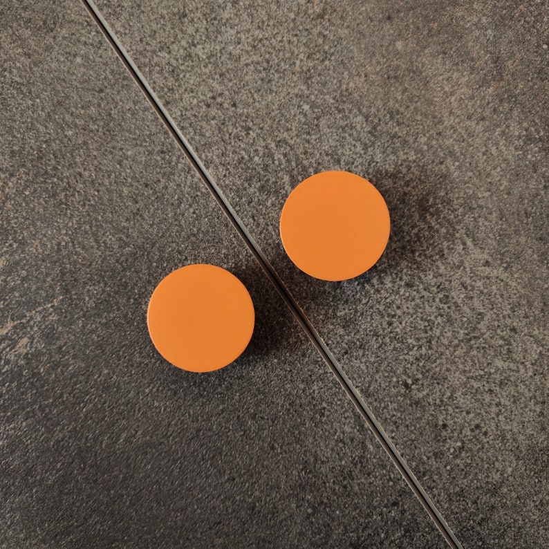 Orange cabinet knobs