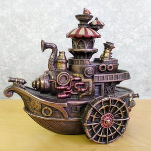 May include: A steampunk-style ship figurine with intricate details, featuring a large wheel, a tower with a striped canopy, and a variety of pipes and gears. The ship is made of bronze and has a weathered finish.