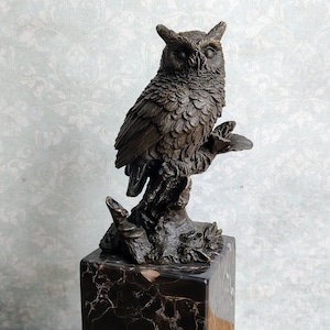 Owl Sculpture on Marble Base A Symbol of Wisdom and Wildlife Art