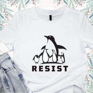 Chemise pingouins, palmes relevées, chemise île Heard, T-shirt pingouins contre les tarifs, résistance subtile aux FDT, chemise pingouins, pingouins résistent