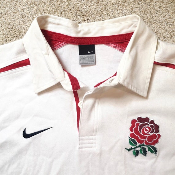 Polo nike rose outlet