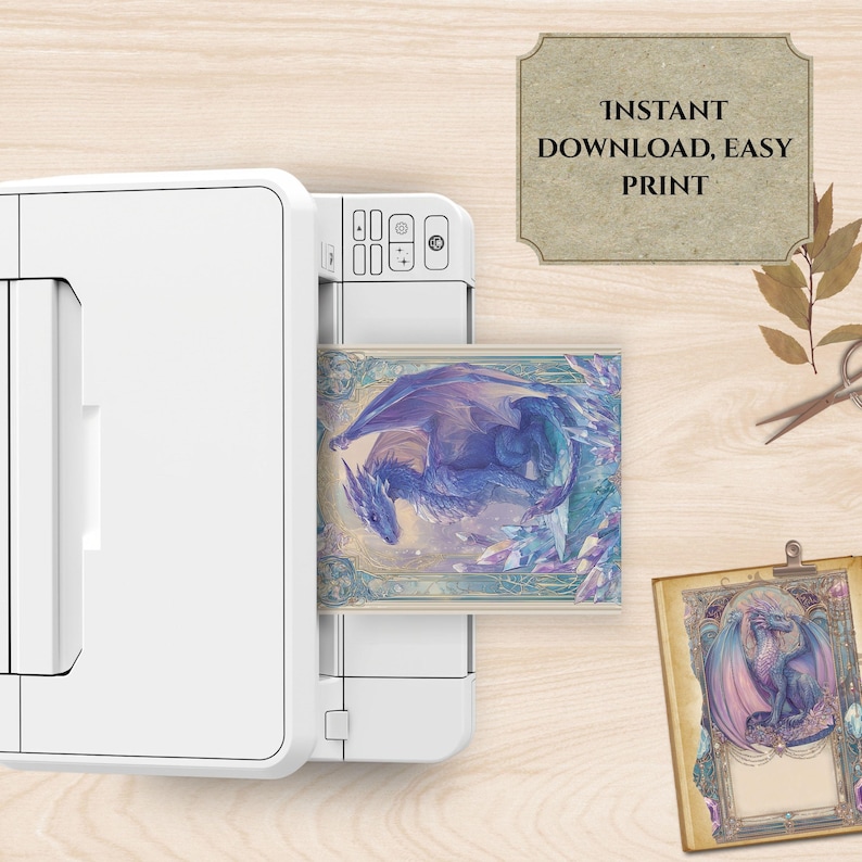 May include: A white printer is shown printing a fantasy art print featuring a blue dragon. The print is labeled "INSTANT DOWNLOAD, EASY PRINT". A second print with a dragon is visible on the right.