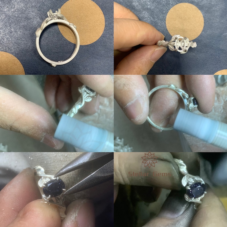May include: A silver ring with a black gemstone set in a floral design. The ring is being worked on by a jeweler, with the gemstone being set in place.